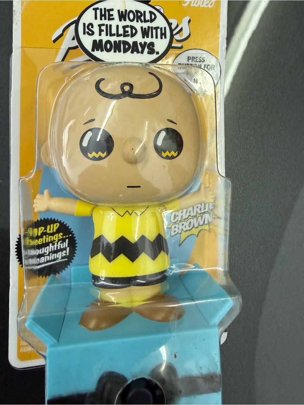 Peanuts Charlie Brown Figure in Yellow and Black with Blue Base